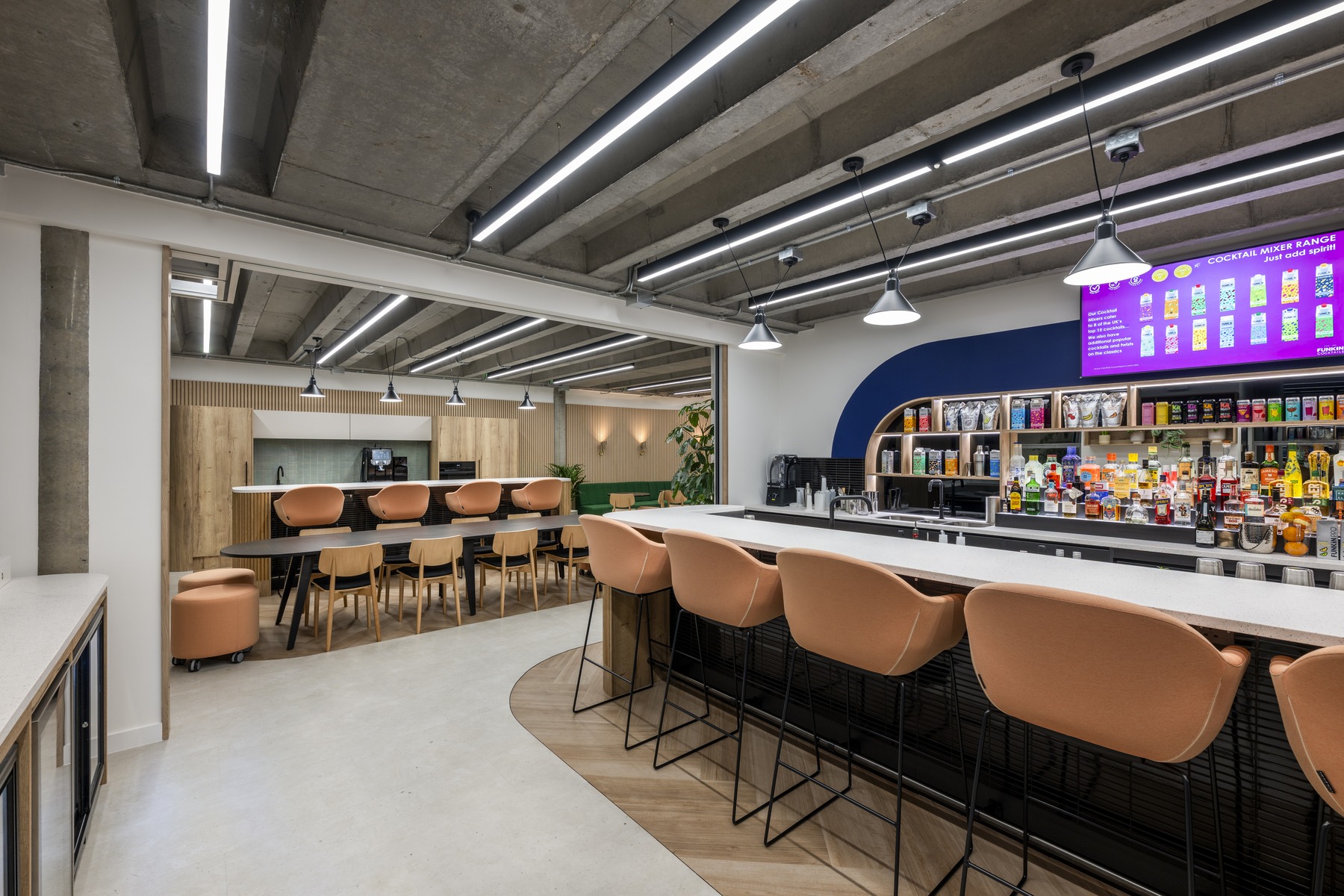 Wide angle of AG Barr open plan workspace