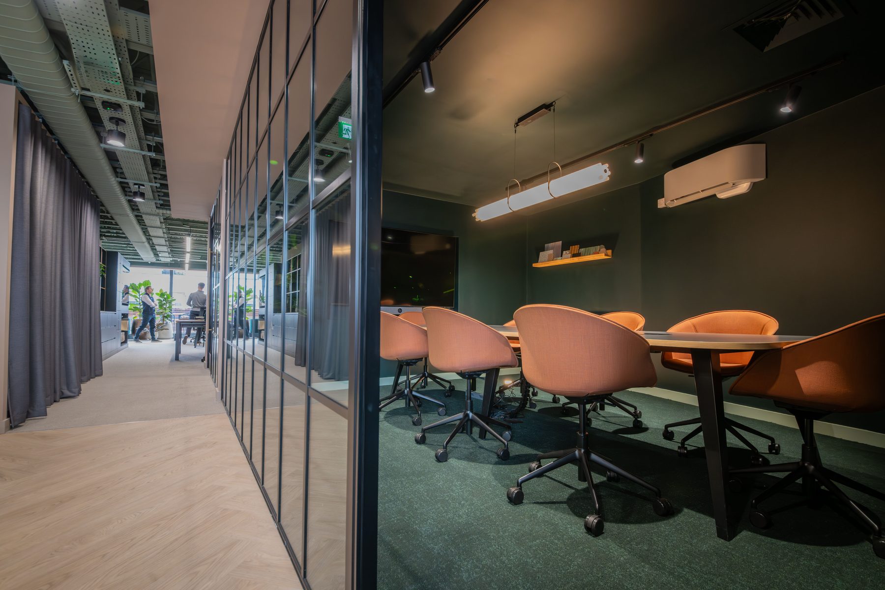 Coda HQ social workspace with terrazzo bar, copper pendant lights and timber stools