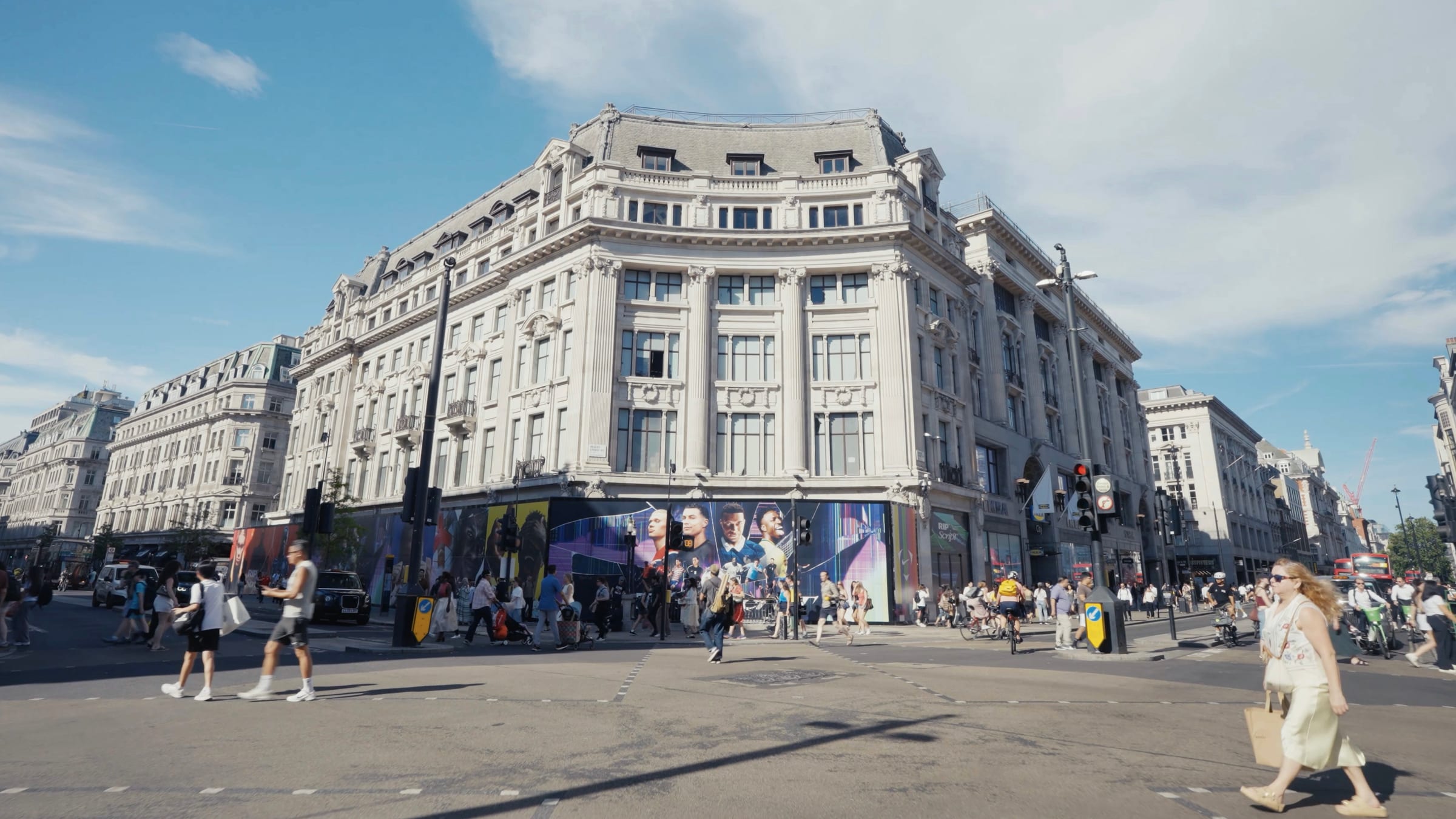 216 Oxford Street's stone facade at Oxford Circus