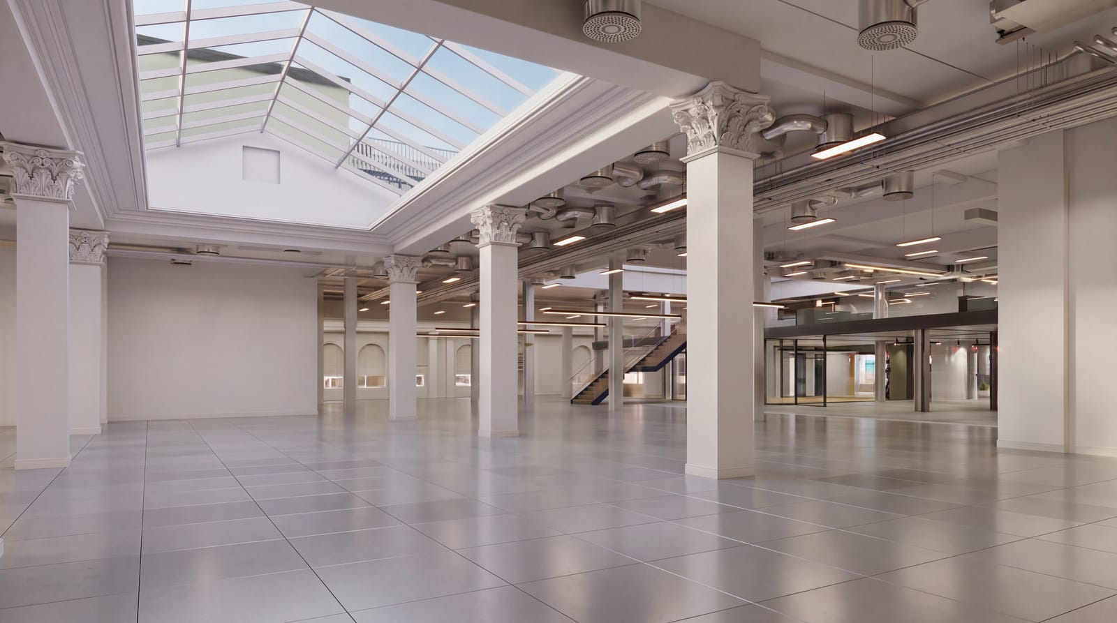 CGI of the new CAT A floor with exposed services, restored skylight and the mezzanine beyond
